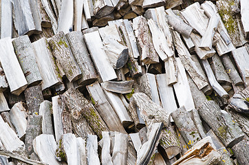 Image showing folded rows of firewood, close-up  