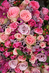 Image showing purple and pink roses wedding arrangement