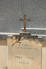 Image showing Tombstone with cross ornament at a French cemetery