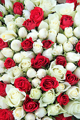 Image showing Red and white roses in a wedding centerpiece