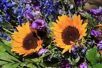 Image showing Sunflowers and purple eustoma