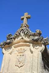 Image showing Tombstone with cross ornament at a French cemetery