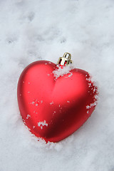 Image showing Heart shaped ornament in the snow