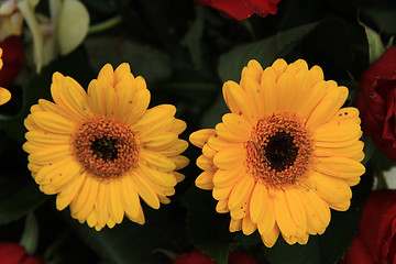 Image showing yellow and red flowers in a bridal arrangement