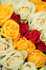 Image showing Yellow, white and red roses in a wedding arrangement