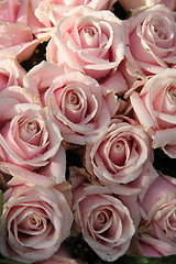 Image showing Pink roses in a wedding centerpiece