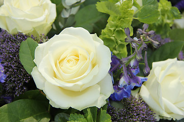 Image showing Blue White Flower arrangement for a wedding