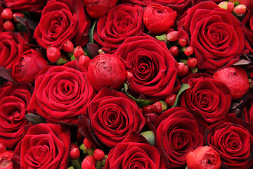 Image showing ranunculus, berries and roses in a group