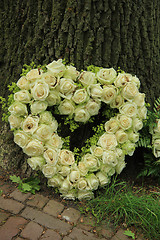 Image showing Heart shaped sympathy flowers