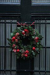 Image showing Traditional Christmas wreath on a door