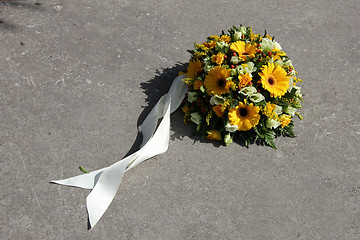 Image showing Yellow sympathy flowers