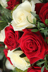 Image showing Red and white roses in a bridal bouquet