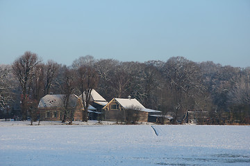 Image showing Farm in a winter forest