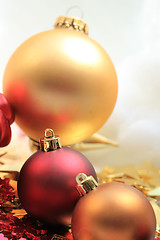 Image showing Christmas decorations in red and gold