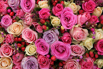 Image showing Bridal decorations in different shades of pink and purple