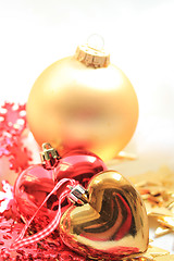 Image showing Christmas decorations in red and gold