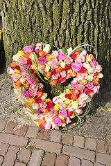 Image showing Heart shaped sympathy flowers