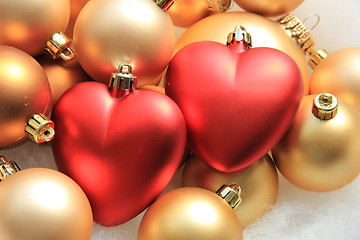 Image showing red heart shaped christmas ornaments