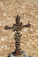 Image showing Old cast iron cross ornament