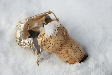 Image showing Champagne cork in the snow