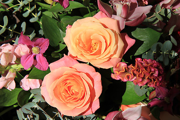 Image showing Orchids and roses in bridal bouquet