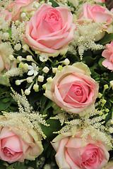 Image showing Pink roses and stephanotis in bridal bouquet