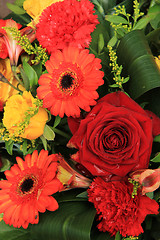 Image showing Red, yellow and orange wedding decorations