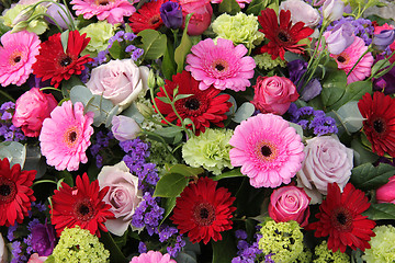 Image showing Wedding arrangement in red, purple and pink