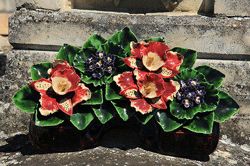 Image showing Ceramic grave flowers