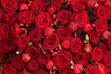 Image showing ranunculus, berries and roses in a group