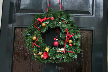 Image showing Christmas wreath on a door