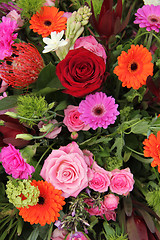 Image showing Flower arrangement in pink, red and orange