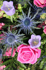 Image showing Floral arrangement in blue, purple and pink
