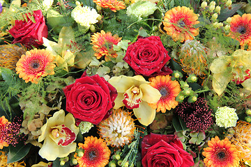 Image showing roses and orchids in a flower arrangement