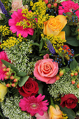 Image showing Mixed flower arrangement in bright colors