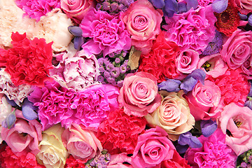 Image showing Bridal decorations in different shades of pink and purple