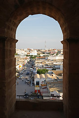 Image showing 	El Djem, City skyline through the arches of amphitheatre