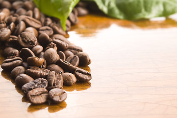 Image showing Coffee on wooden background 