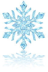 Image showing Light blue crystal snowflake on glossy white