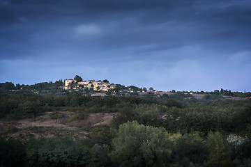 Image showing Illuminated Village in Tuscany after sunset