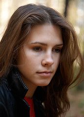 Image showing Thoughtful brunette girl