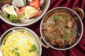 Image showing Curry and salad bowls from above