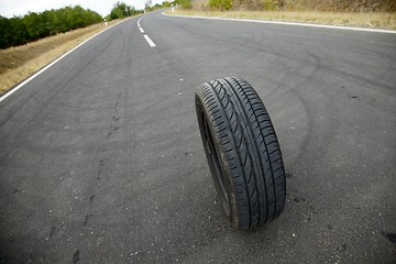 Image showing Wheel on road