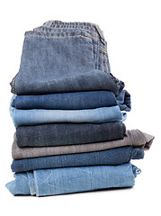 Image showing Stack of jeans isolated on white background