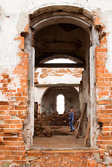 Image showing Woman in ruin church