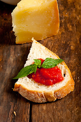 Image showing Italian fresh tomato and basil bruschetta