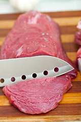 Image showing raw beef cutting