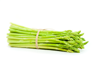 Image showing fresh asparagus over white