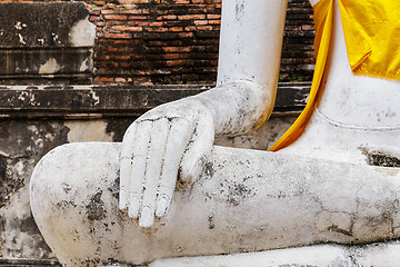 Image showing Part of the white ancient buddha statue