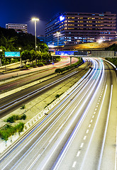 Image showing Traffic trail on highway at night